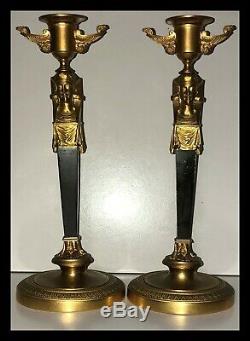 Stunning pair of antique Egyptian Revival gilt bronze candlesticks. Must see