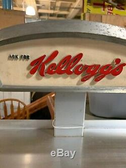 Vintage Authentic Kelloggs polished aluminum 4 shelf cereal display. Must See
